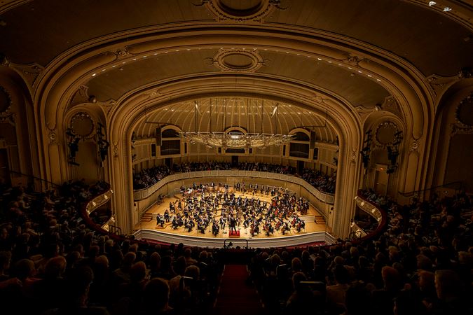 a wide shot of the Orchestra from the middle of the balcony