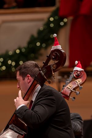 Closeup of mini Santa Claus hats on the basses