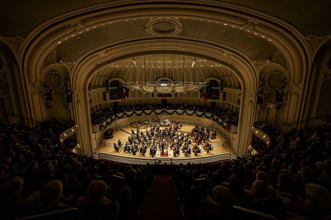 the full orchestra with Mäkelä conducting Beethoven 7, as seen from high up in the Orchestra Hall gallery