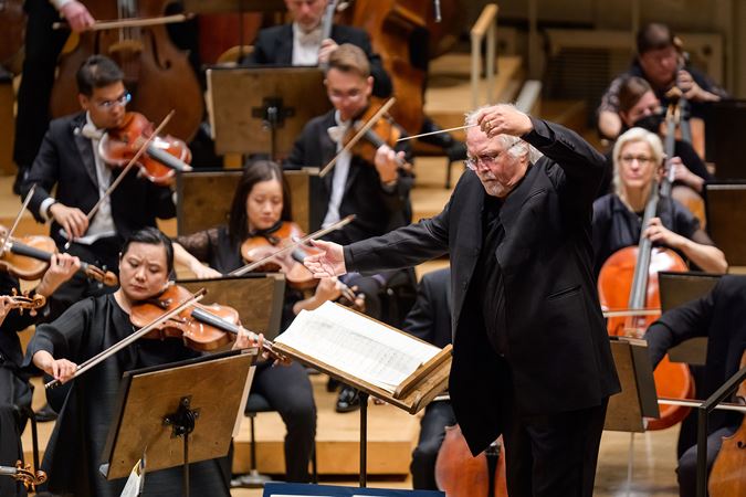 conductor raised baton