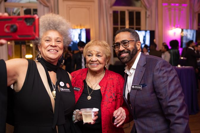 Barbara Wright-Pryor (center) pauses for a photo at an AAN reception.