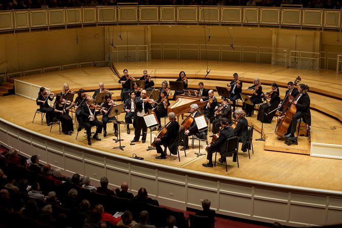 the full string orchestra performs Vivaldi's The Four Seasons