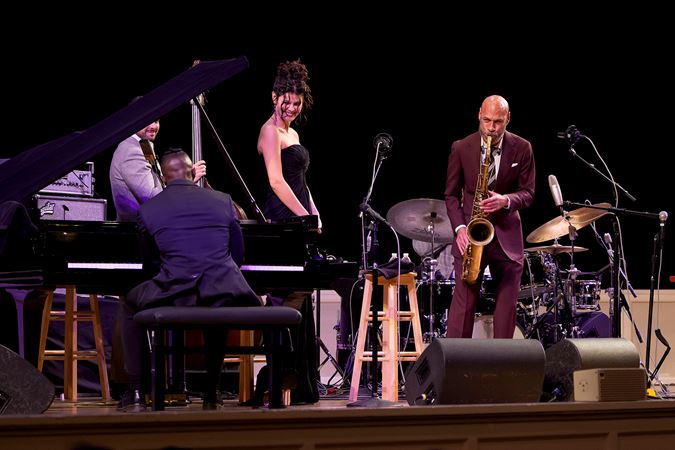 Wide shot of the Joshua Redman Quartet and singer Gabriella Cavassa on stage