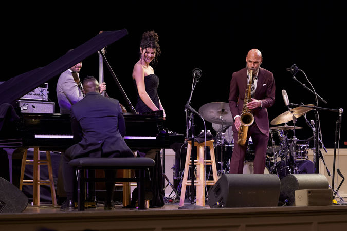 Wide shot of the Joshua Redman Quartet and singer Gabriella Cavassa on stage