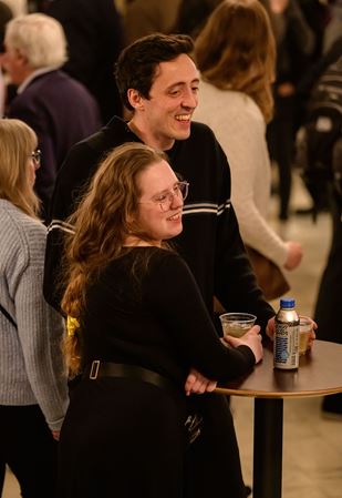 Patrons chatting in the inner lobby of the main floor