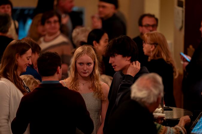 A crowded main floor lobby of patrons