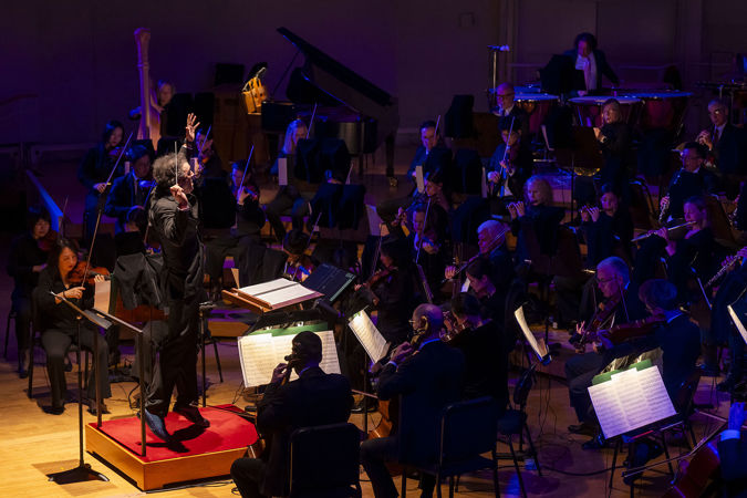 conductor raised arms