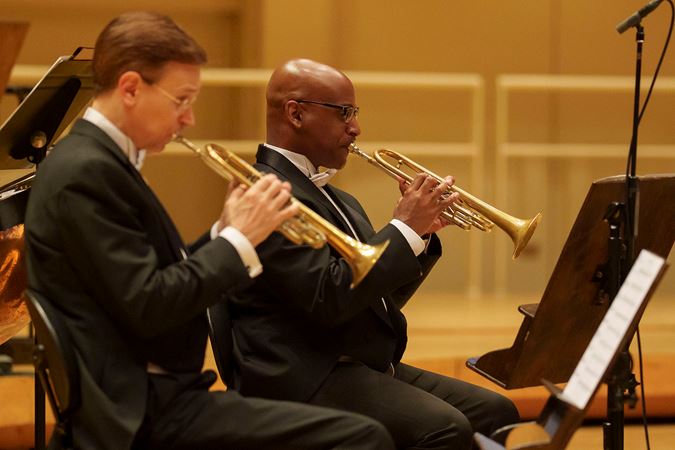 Closeup action shot of CSO trumpets John Hagstrom and Tage Larsen