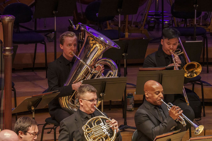 Closeup of Civic tuba Ben Poirot and trombone Dustin Nguyen