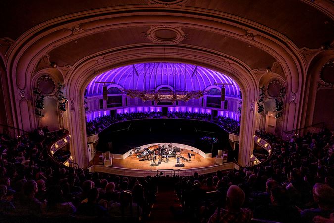 a view from the balcony as the sold-out audience watches Herbie and his band perform