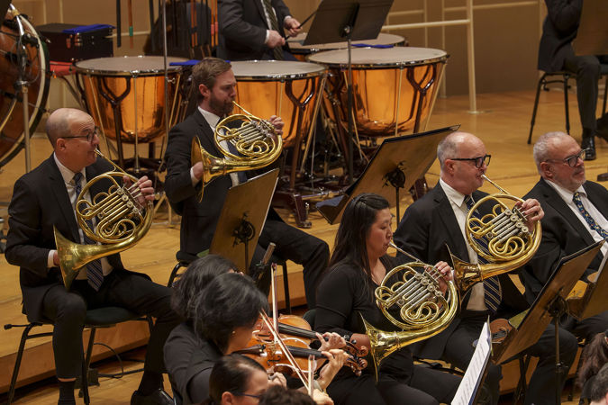 Group shot of CSO horn section