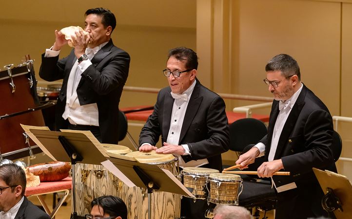 the percussion section of the Sinfónica de Minería performs Revueltas' La noche de los mayas