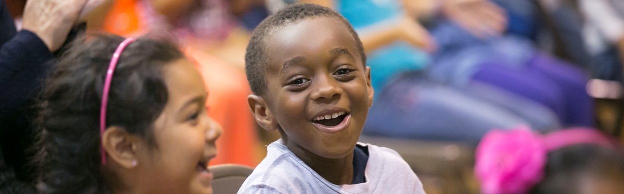 laughing kids at a family concert