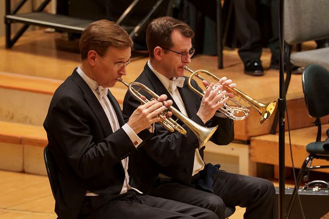 Close up of two CSO trumpet players, one of them being John Hagstrom