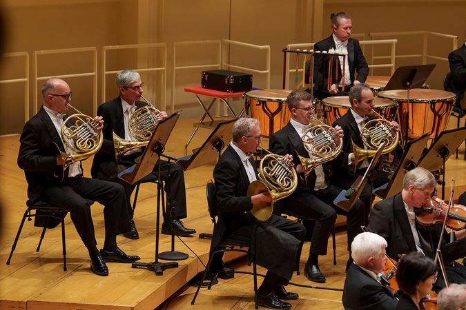 Group shot of the CSO horn section