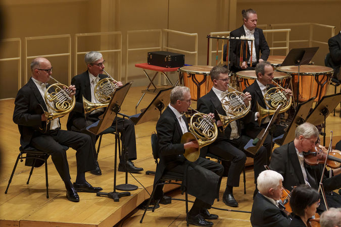 Group shot of the CSO horn section