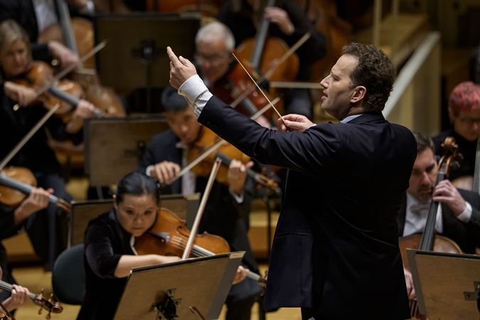 Nikolaj Szeps-Znaider gestures to the woodwind section from the podium