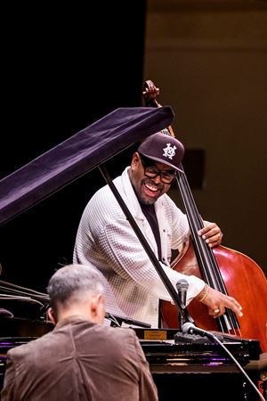 Christian McBride, on bass, smiles at pianist Brad Mehldau as they riff off of one another
