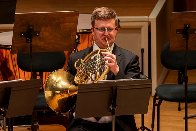 CSO principal horn Mark Almond performs