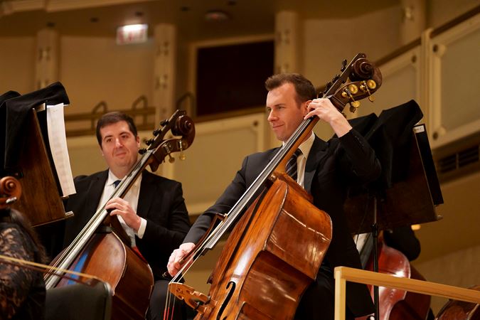 Close up shot of CSO principal bass Alex Hanna and bass Alex Horton