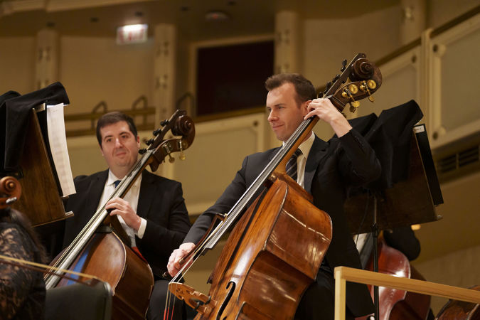 Close up shot of CSO principal bass Alex Hanna and bass Alex Horton