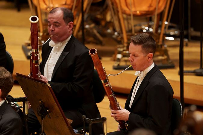 Closeup of two CSO bassoon players, Miles Maner and William Buchman