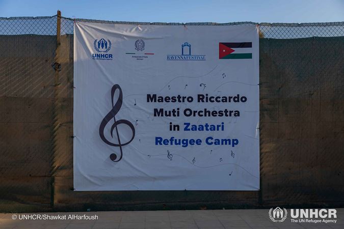A poster announcing the concert with Muti at the Zaatari refugee camp
