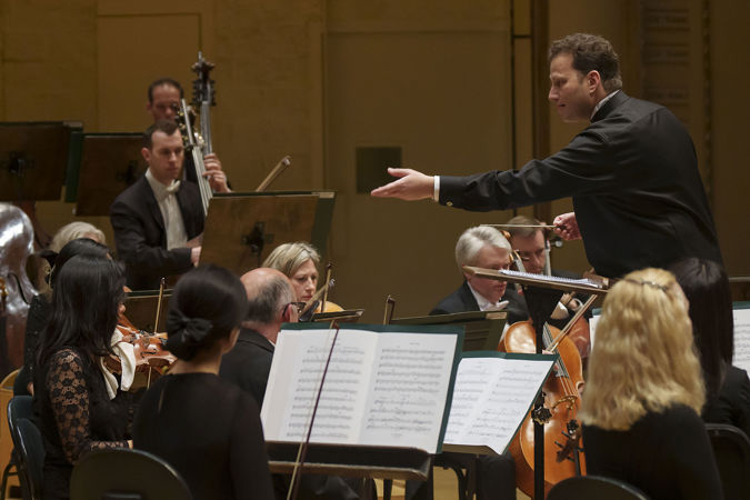 conductor cueing violins