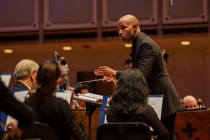 Guest conductor Daniel Bartholomew-Poyser leading members of the CSO
