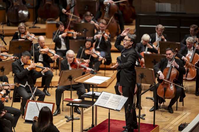 conductor arms up