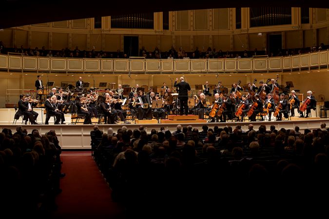 point of view: the audience watches from the back of the Main Floor as the orchestra performs Tüür's accordion concerto