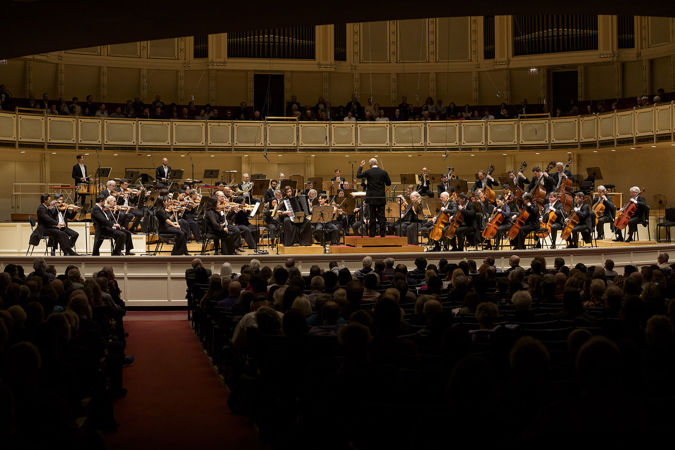point of view: the audience watches from the back of the Main Floor as the orchestra performs Tüür's accordion concerto