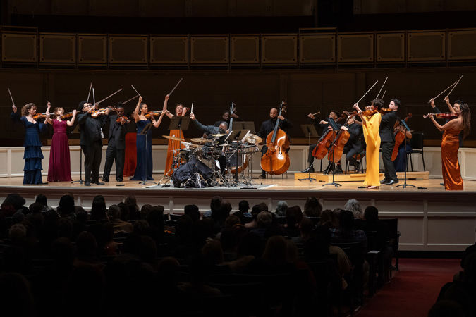 Josh Jones and the Sphinx Virtuosi perform the final note of Curtis Stewart's Drill