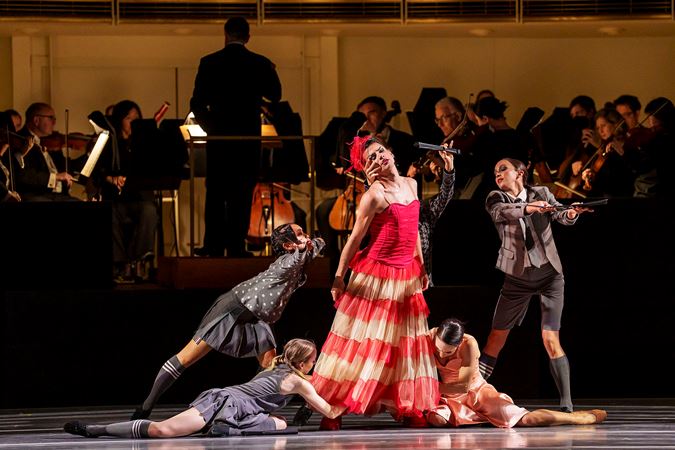 An action shot of The Joffrey Ballet dancers from Blanc's world premiere choreography titled Les Bœufoons