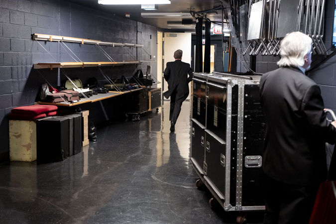 musician running backstage