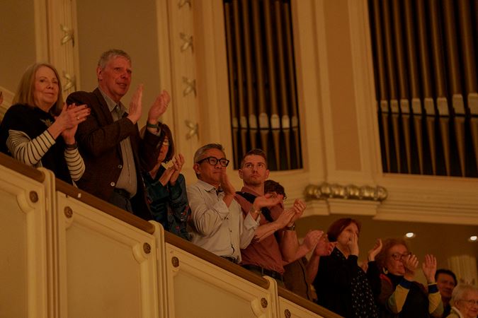 Audience members clapping from the Terrace
