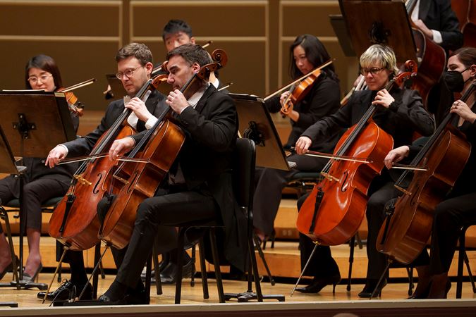 Group shot of the CSO cellos on stage