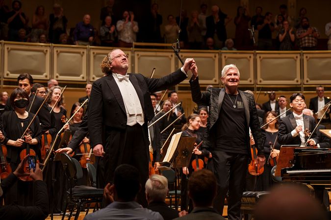 conductor and soloist bowing