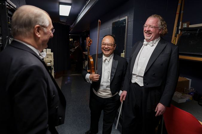 conductor and concertmaster backstage