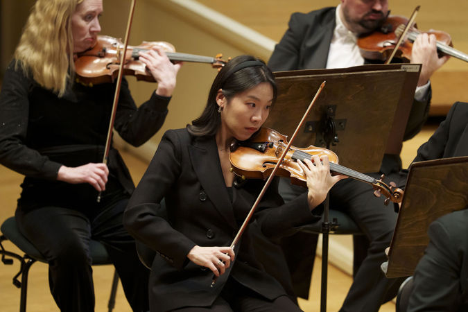 CSO violinist So Young Bae concentrates on the music