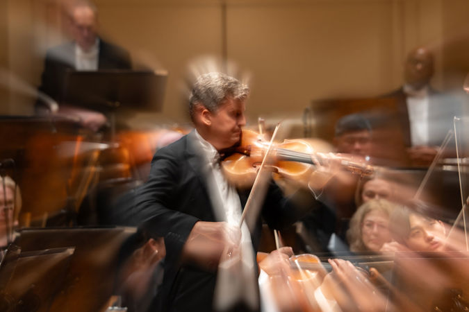 Closeup shot of guest violinist James Ehnes on stage