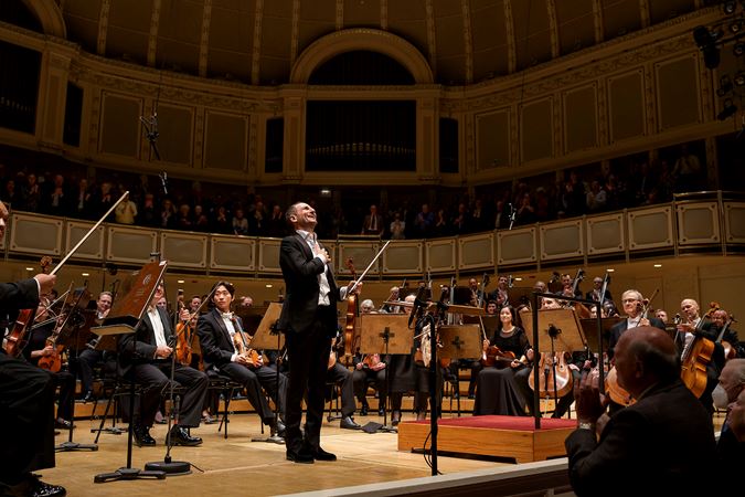 Antoine Tamestit takes a solo bow, viola in hand, after performing an encore