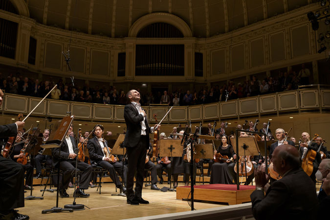 Antoine Tamestit takes a solo bow, viola in hand, after performing an encore