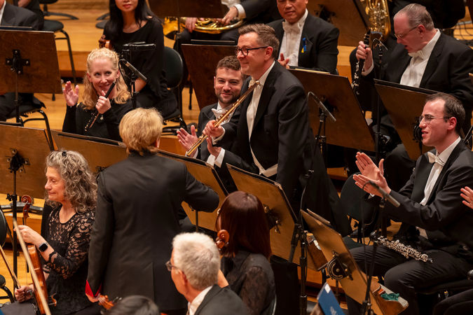 flute player bowing