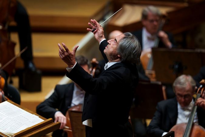 Closeup action shot of conductor Riccardo Muti