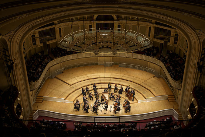 point of view of the CSO strings performing on stage from high up in the gallery