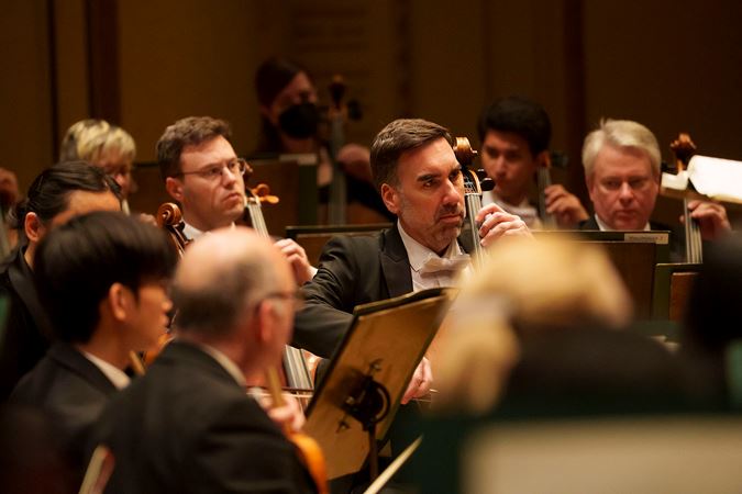 Kenneth Olsen and other members of the CSO cello section watch conductor Jakub Hrůša for a cue