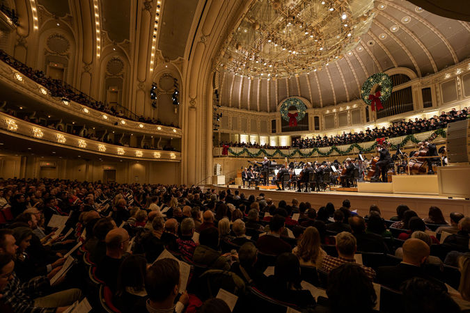 Wide shot of the CSO & Chorus with conductor John Morris Russell on stage