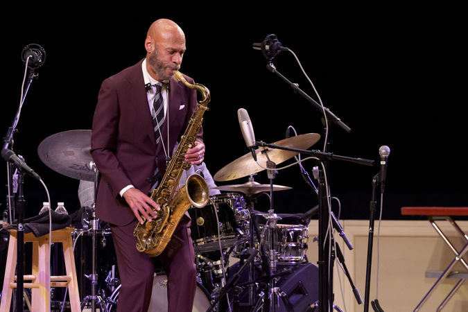 Closeup of Joshua Redman on stage with his quartet