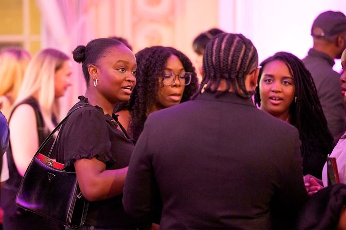 Four Underground attendees chatting in Grainger Ballroom